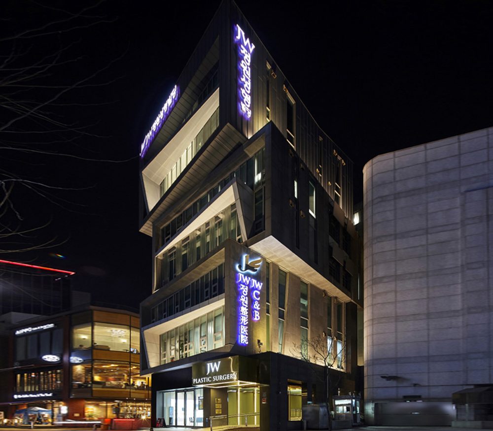 JW Plastic Surgery building at night, Seoul